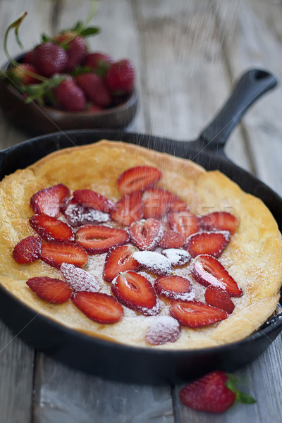 Stock photo: Big dutch pancake with starwberry
