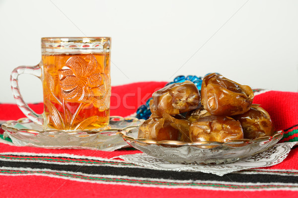 Dates and tea Stock photo © karammiri