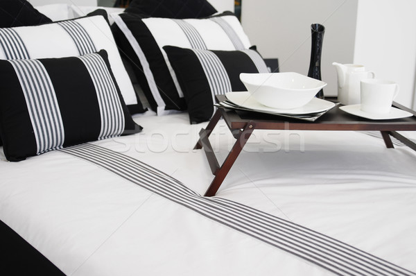 Cama suave almohadas casa lámpara alfombra Foto stock © karammiri