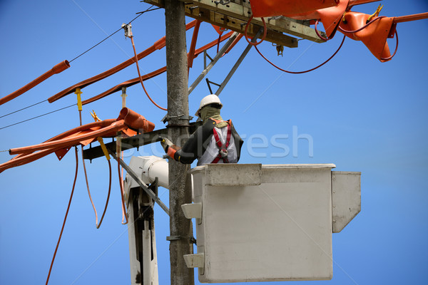 Poder linha homens trabalhando construção azul Foto stock © karammiri