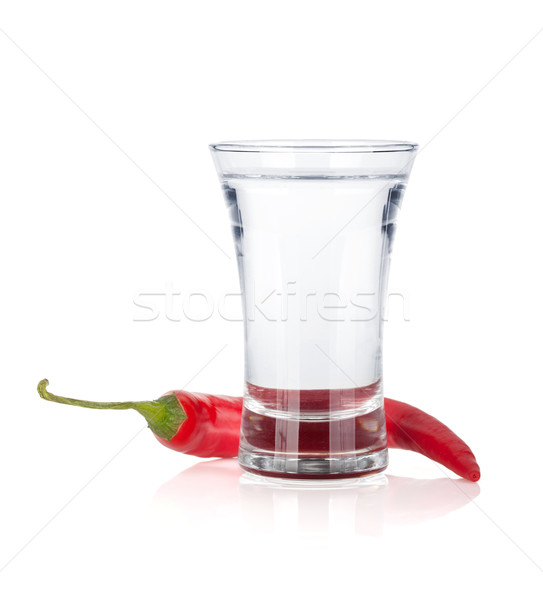 Shot of vodka and red hot chili pepper Stock photo © karandaev