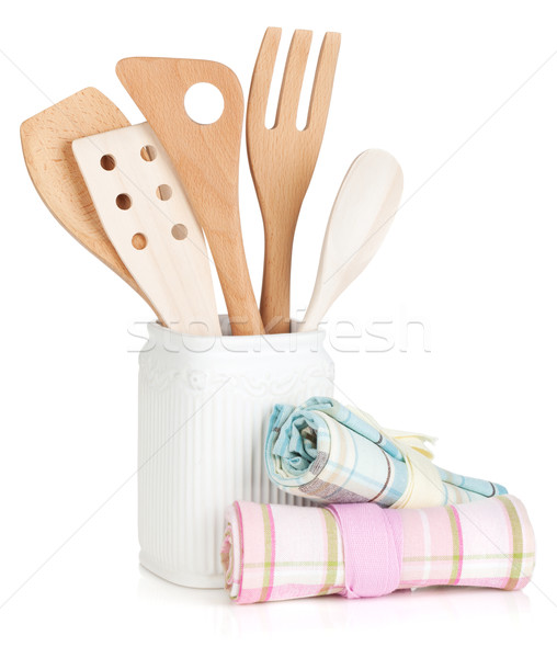 Kitchen utensils in holder and towels Stock photo © karandaev