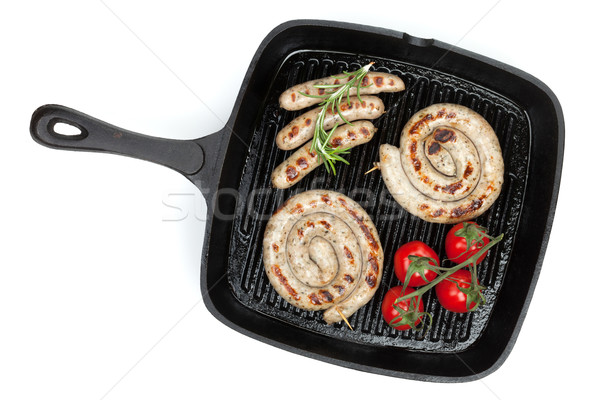 Grilled sausages on frying pan Stock photo © karandaev