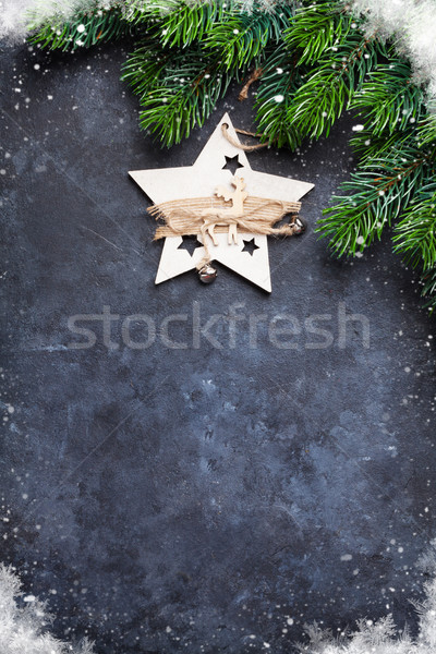 Christmas fir tree and decor over stone background Stock photo © karandaev