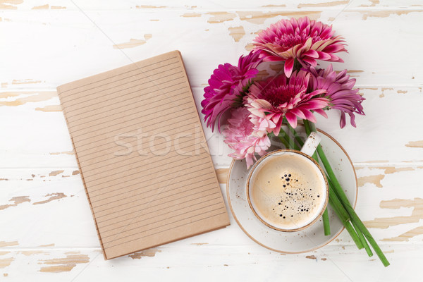 Coffee cup and gerbera flowers Stock photo © karandaev