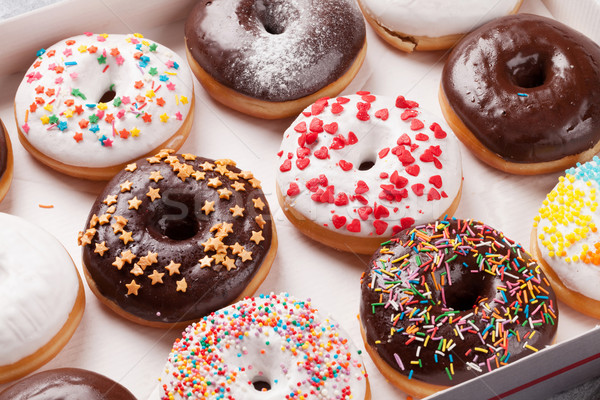 Stockfoto: Kleurrijk · donuts · vak · steen · tabel · voedsel