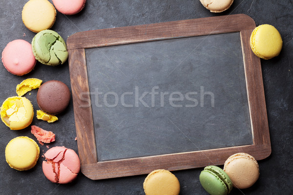 Colorful macaroons and blackboard Stock photo © karandaev