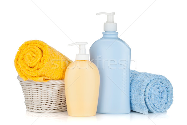 Shampoo bottles and towels Stock photo © karandaev