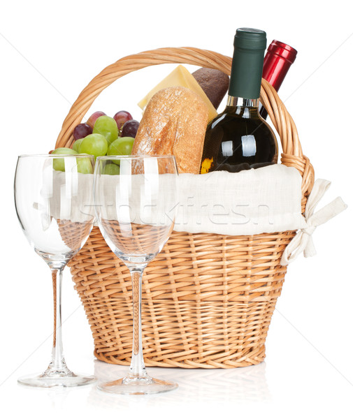 Piknik sepeti ekmek peynir üzüm şarap şişeler Stok fotoğraf © karandaev
