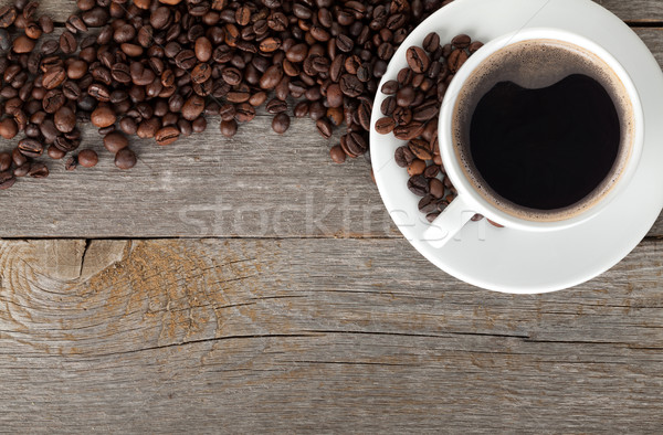 Tasse de café fèves table en bois espace de copie alimentaire bois [[stock_photo]] © karandaev
