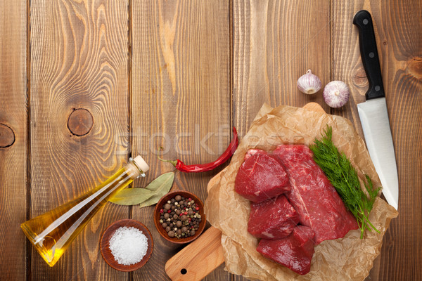 Surowy filet przyprawy drewniany stół górę Zdjęcia stock © karandaev