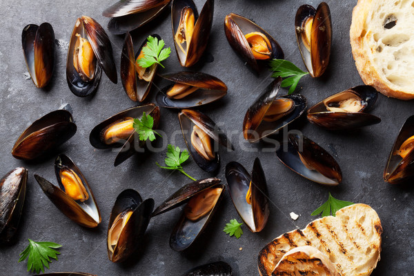 Mussels and bread toasts Stock photo © karandaev