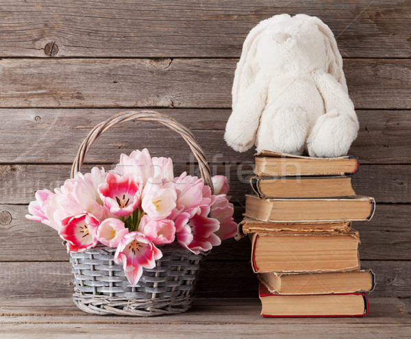 Pink tulips bouquet basket and rabbit toy Stock photo © karandaev
