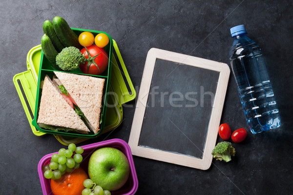 Lunch box with vegetables and sandwich Stock photo © karandaev