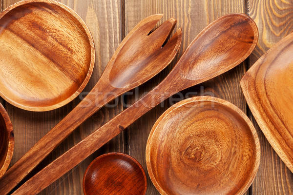 Wood kitchen utensils over wooden table Stock photo © karandaev