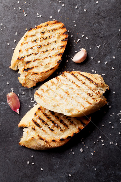 Toast chleba soli czosnku kamień tabeli Zdjęcia stock © karandaev