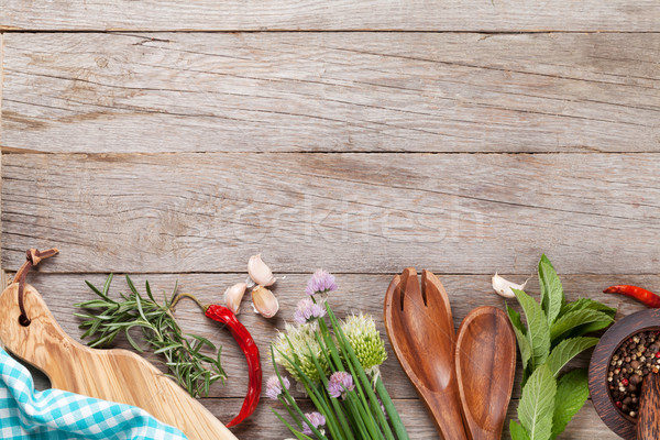 Fresh herbs on garden table Stock photo © karandaev