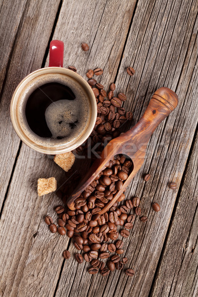 Taza de café frijoles azúcar moreno mesa de madera superior vista Foto stock © karandaev