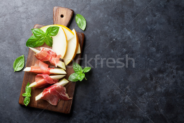 Friss dinnye prosciutto bazsalikom antipasti felső Stock fotó © karandaev