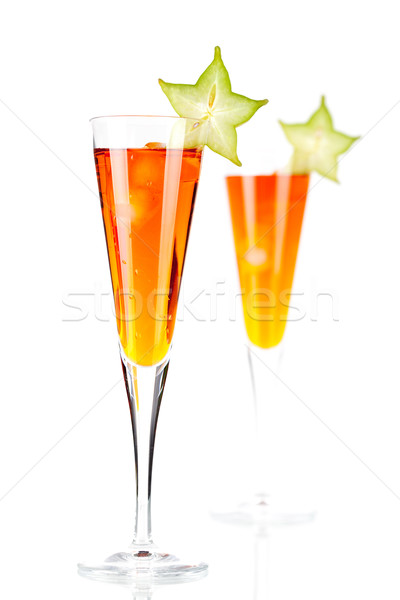 Orange alcohol cocktail with carambola Stock photo © karandaev