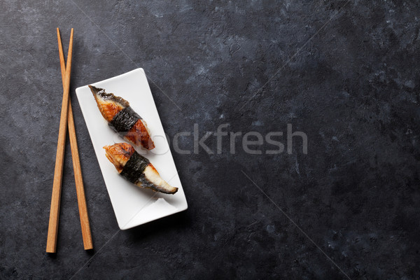 Ayarlamak yılanbalığı sushi taş tablo üst Stok fotoğraf © karandaev