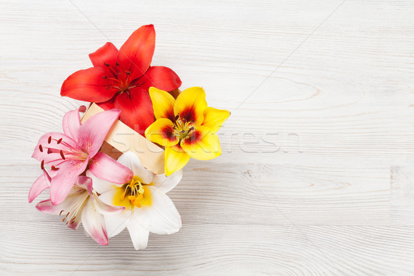 Colorato giglio fiori basket legno spazio Foto d'archivio © karandaev
