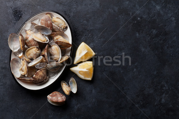 Fresche frutti di mare ciotola pietra tavola top Foto d'archivio © karandaev