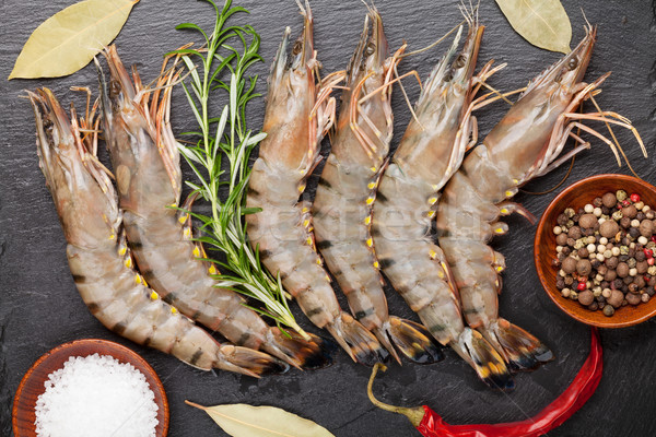 Fresh raw tiger prawns and spices Stock photo © karandaev