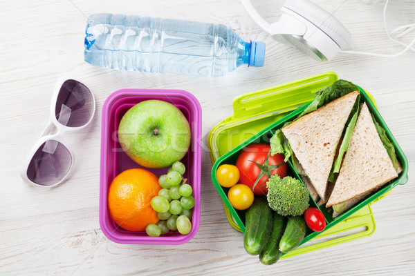 Lunch box with vegetables and sandwich Stock photo © karandaev