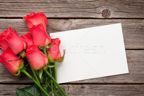 San valentino biglietto d'auguri rose rosse legno top view Foto d'archivio © karandaev