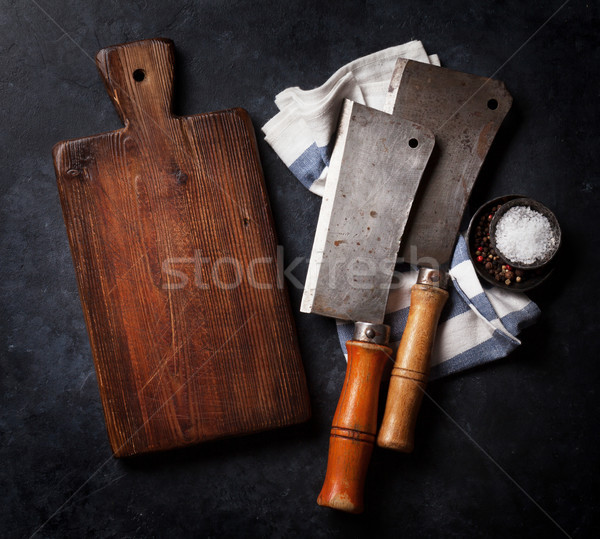 Butcher. Vintage meat knives, spices and board Stock photo © karandaev