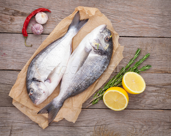 Friss hal főzés fűszer fűszerek fa asztal Stock fotó © karandaev