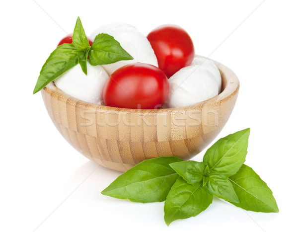 Mozzarella cheese with cherry tomatoes and basil Stock photo © karandaev