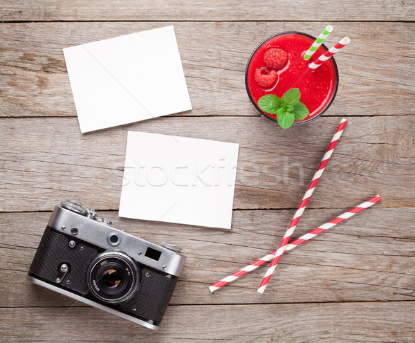 Vintage camera, two photos and raspberry smoothie Stock photo © karandaev