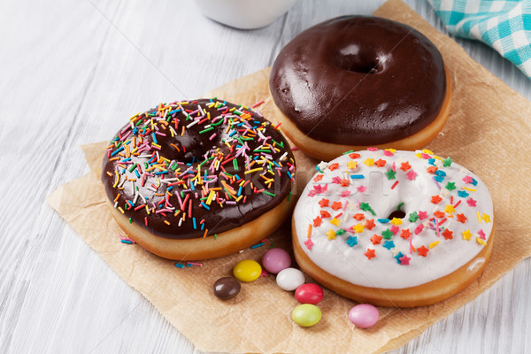 Donuts and candies Stock photo © karandaev