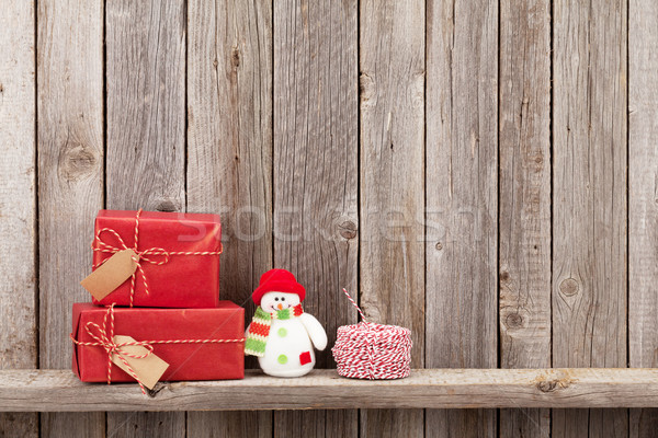 Natal caixas de presente boneco de neve brinquedo parede Foto stock © karandaev