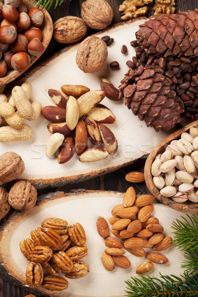 Stock photo: Various nuts on wooden table