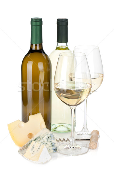 White wine bottles, two glasses, cheese and corkscrew Stock photo © karandaev