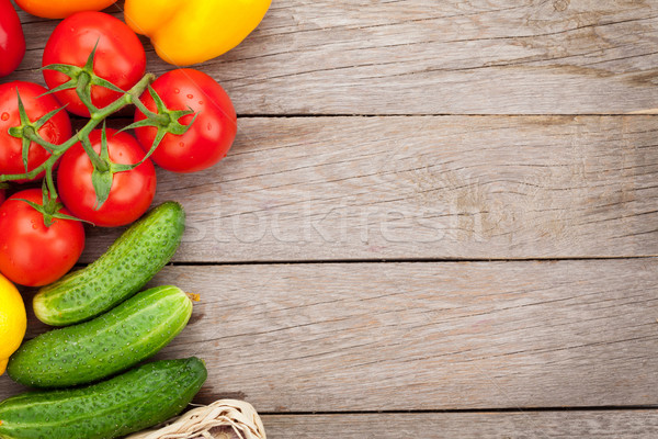 Stock photo: Fresh ripe vegetables on wooden table