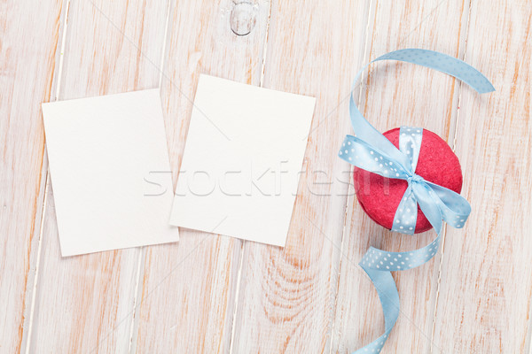 Photo frames or greeting cards and macarons with ribbon Stock photo © karandaev