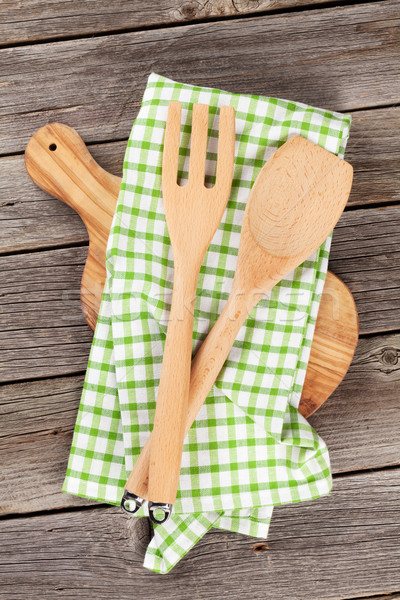 Cooking utensils on wooden table Stock photo © karandaev