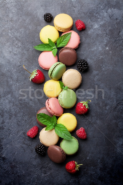 Colorful macaroons and berries Stock photo © karandaev