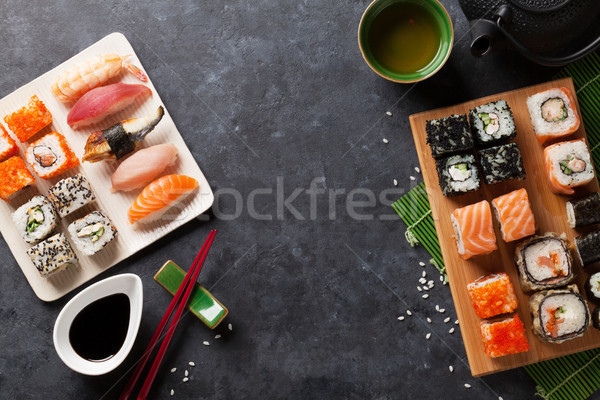 Set of sushi, maki and green tea Stock photo © karandaev
