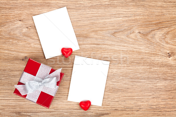 Blank valentines photo frames and small red gift box Stock photo © karandaev