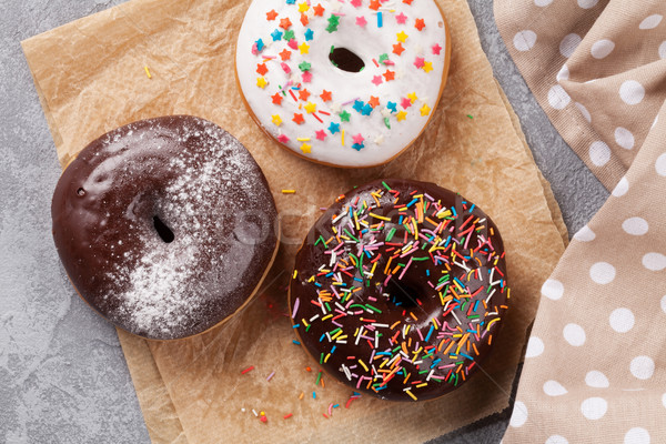 Kleurrijk donuts steen tabel top Stockfoto © karandaev