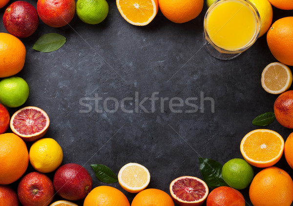 Fresh ripe citruses frame. Lemons, limes and oranges Stock photo © karandaev
