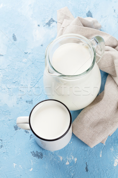 Tejesflakon csésze kő asztal tejtermékek felső Stock fotó © karandaev