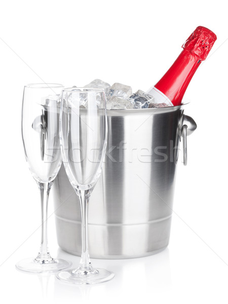 Stock photo: Champagne bottle in ice bucket