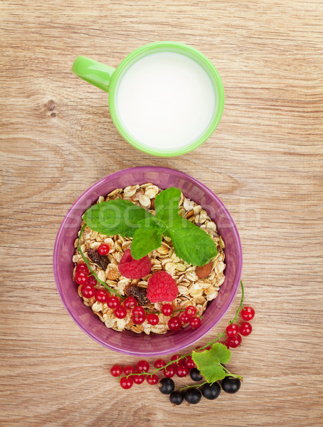 Sani colazione muesli latte tavolo in legno Foto d'archivio © karandaev