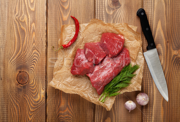 Foto stock: Filé · bife · temperos · mesa · de · madeira · topo